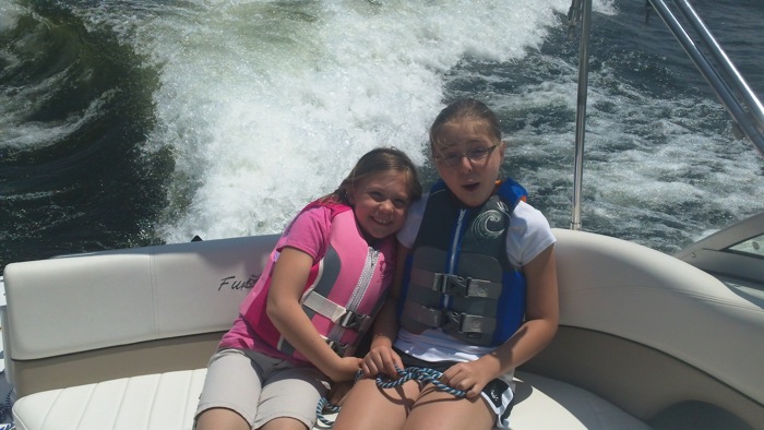 Katelyn and Emmy on Grandpa H's new speed boat